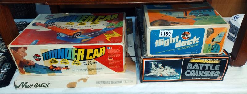 Four vintage Airfix games including flight deck, battle cruiser, Thunder car and other