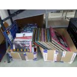 A quantity of Elvis LP's and VHS tapes.