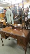 A mahogany triple mirror dressing table. COLLECT ONLY.