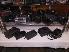 A quantity of cameras including Canon, Ricoh and Olympus.