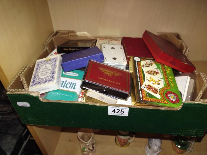 A good collection of playing cards and vintage playing cards.
