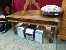 A teak coffee table. 90cm x 60cm x Height 45cm. COLLECT ONLY.
