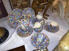 A 22 piece Royal Tudor ware 'Fantasy' tea set. 4 pieces A/F. COLLECT ONLY.