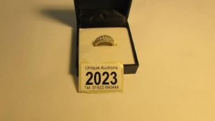 A 9ct gold ring, size N, 2.6 grams.