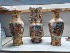 A pair of Chinese vases and 1 other. 30cm x 35cm