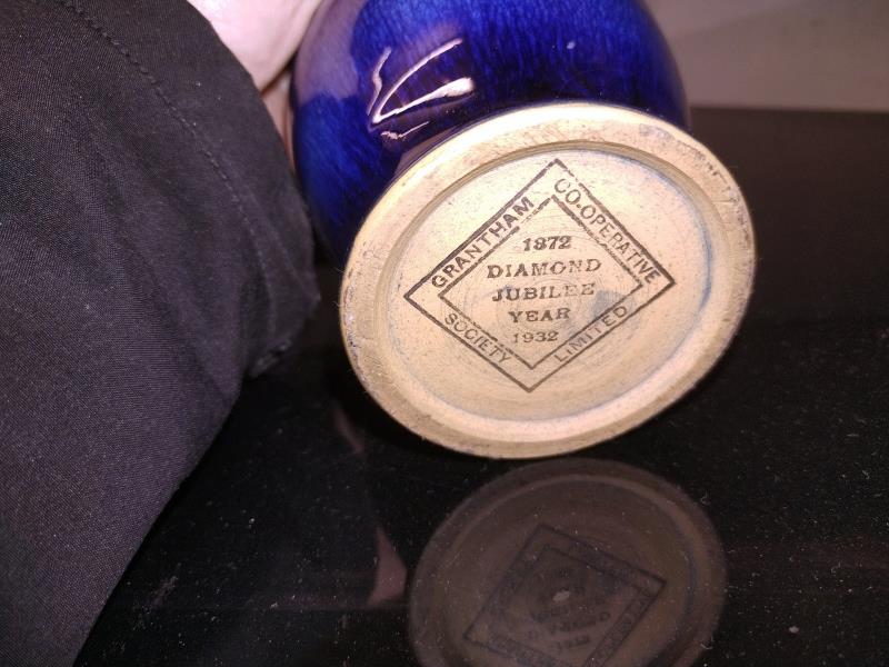 A Grantham Co-Operative Society Ltd Diamond Jubilee year 1872-1932 Splash blue glazed vase. Height - Image 2 of 2