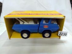 A boxed Tonka mini-Tonka tow truck, No: 1235, in very good condition