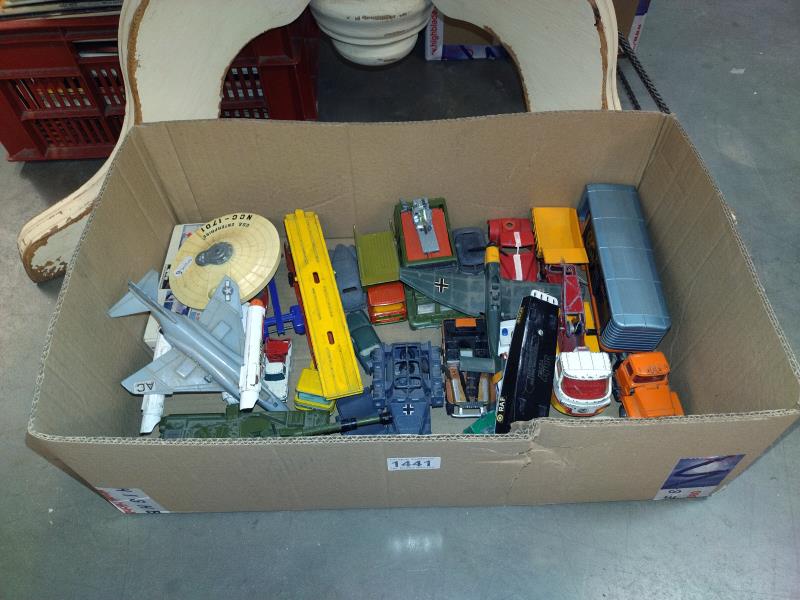 A box of play worn Dinky/Corgi and Matchbox Diecast toys.