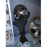 An art nouveau style figure with mirror. COLLECT ONLY.