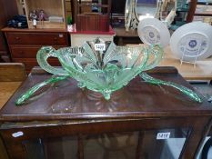 A large Art Deco green glass serving bowl with servers.