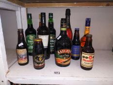 A selection of drink bottles including Baileys, Royal wedding Ale and Henninger export bier