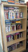 Five shelves of DVDs approximately 350