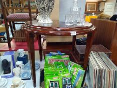 A round mahogany coffee table. 75cm x 60cm. COLLECT ONLY.