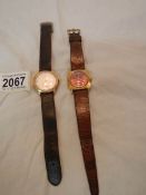 A gent's Timex wrist watch with leather strap in working order and a Oris gent's wrist watch working
