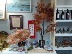 A mixed lot of oriental items including ceramics, parasol etc., COLLECT ONLY.