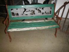 A child's garden bench with cast iron sides and back panel, COLLECT ONLY.