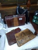 A quantity of crocodile and snakeskin handbags, leather early-mid 20th century.