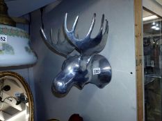 A polished aluminium stag head wall ornament. Hat/coat rack. 27cm x 33cm x 25cm