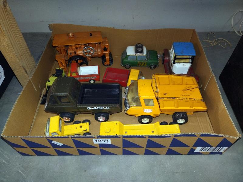 A box of Tonka & Japanese pressed steel toys including cast iron steam roller