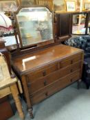 An Edwardian oak mirror back chest of drawers. 107cm x 52cm x 82cm. Mirror height 150cm, COLLECT