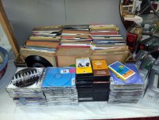 A good lot of 45's single records, cd's and cassette tapes