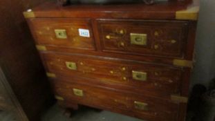 A brass inlaid Chinese chest of drawers, 61 x 61 x 30 cm deep. COLLECT ONLY.
