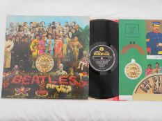The Beatles Sgt Peppers UK 1st press LP record PCS 7027 XEX 637-1 and XEX 638-1 EX+ The vinyl is