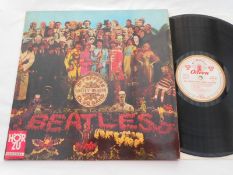 The Beatles - Sgt Peppers German 1967 1st press record LP SHZE 401 A-1 and B-1 EX The vinyl is in