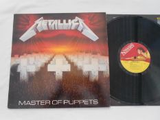Metallica ? Master of Puppets. UK record LP MFN 60 A-3 and B-3 NM The vinyl is in excellent plus