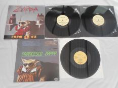 2 x Frank Zappa records Both in mint condition E 2402341 and EJ 27 0256 Mint The vinyl are in