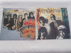 Travelling Wilburys Collection of 2 x LP?s Both vinyls and sleeves are in near mint condition Really