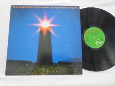 Ashra ? New age of Earth German 1st press record LP 28 958 XOT A-1/77S & B-1/77S EX+ The vinyl is in