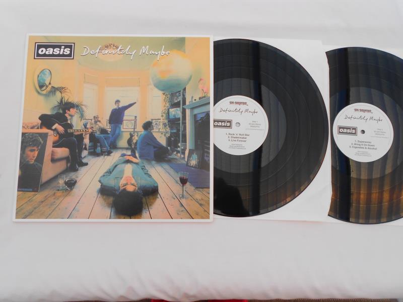 Oasis ? Definitely Maybe UK double LP RKIDLP70 NM Both vinyls are in near mint condition with a high