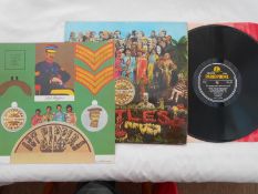 The Beatles Sgt Peppers UK 1st press LP record PCS 7027 XEX 637-1 and XEX 638-1 EX The vinyl is in