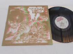 The Cramps ? Off the Bone UK LP 1st press record Illegal Records ILP 012 A and B N/EX The vinyl is