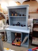 A blue painted pine desk. (110cm x 51cm x Height 77cm). Shelf brackets missing from shelves. Plus
