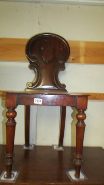 A Victorian mahogany hall chair. COLLECT ONLY,