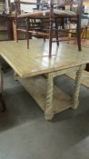 A superb quality contemporary dining table on barley twist legs. COLLECT ONLY.