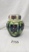 A small Moorcroft ginger jar, approximately 11 cm.