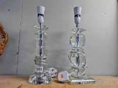 2 glass table lamp bases. (Minor chip to one base)