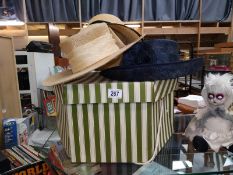 3 ladies hats and a hat box