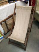 A pair of vintage quality canvas deckchairs