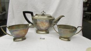 A three piece silver tea set, Charles William Fletcher 1927. Approximately 1000 grams.