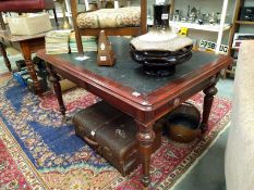 An Edwardian mahogany office desk with leather top. 141cm x 92cm x height 77cm