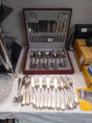 A boxed Viners cutlery set (44 piece) and a quantity of loose cutlery.