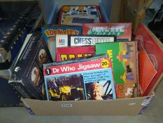 A quantity of children's board games etc including Doctor Who jigsaw, fuzzy felt farm etc