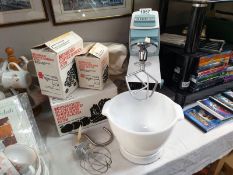 A vintage Kenwood chef with accessories.