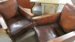 A pair of 1930's oak framed arm chairs, COLLECT ONLY.