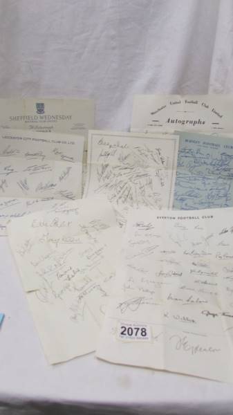 A collection of facsimile football team signatures.