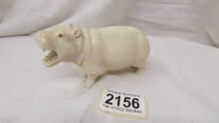 A late 19th/early 20th century signed ivory hippopotamus.